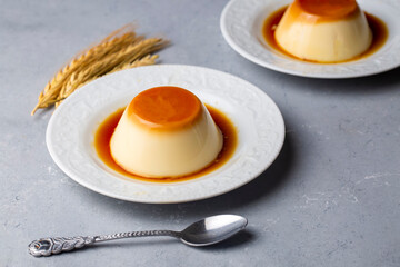 Wall Mural - Cream caramel pudding with caramel sauce in plate