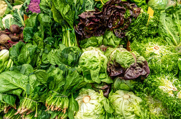 Wall Mural - Vegetable market. Stall with fresh green vegetables