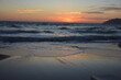 pomarańczowy zachód słońca nad morzem, orange sunset over the sea, sandy beach by the sea at sunset