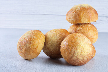 Canvas Print - Corn and cheese bread, displayed on gray background