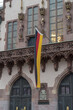 Shot of the German flag on a building in Holzhausen Park in Frankfurt, Germany