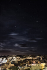 Poster - Beautiful scene of dark sky with stars over a castle and mountains