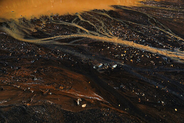 Sticker - Scenic view of tiny wet rocks on the beach