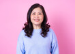© Timeimage - Portrait of middle aged Asian woman on pink background