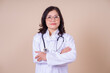 © Timeimage - Image of middle aged Asian female doctor on background