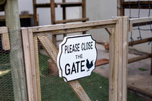 Please Close The Gate Informative Sign On Mesh Gate At Poultry Farm