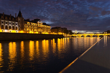 Poster - Evening scenery of Pont Neuf across the Seine river in Paris, France