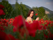 © Stocked House Studio - Beautiful girl posing in poppy field on sunny day