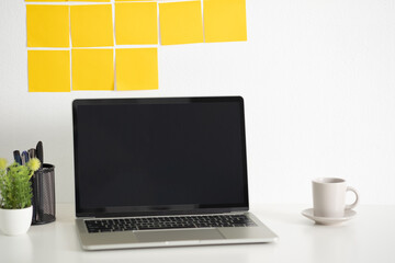 Wall Mural - yellow post note paper, memo paper on a screen laptop computer. scheduled for job or short note for 