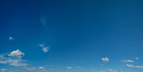 deep blue sky and white different types of clouds in it. beautiful nature background.