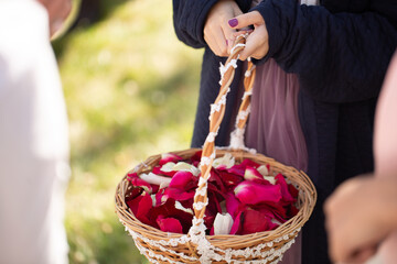 Canvas Print - Children with a basket throwing rose petals at a wedding