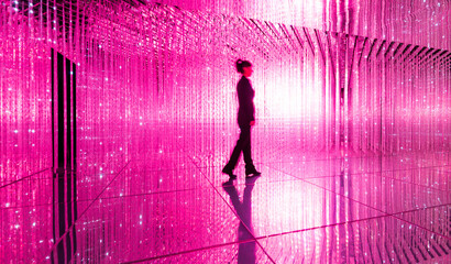Businesswoman walking in the beautiful bokeh light