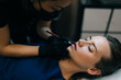 © BullRun - Master do permanent makeup lips procedure of girl