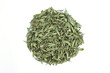 dry thyme leaves pile in a form circle on a white background