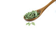Dry thyme leaves pile in a wooden spoon on a white background