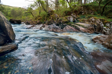 The Bracklinn Falls are a series of waterfalls north-east of Callander, Scotland, UK on the course of the Keltie Water, where the river crosses the Highland Boundary Fault.