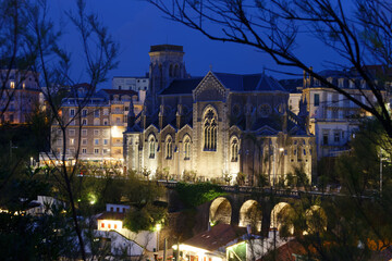 Wall Mural - Night view of church Saint Eugenie in Biarritz, France