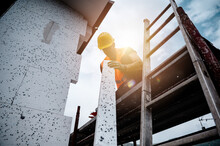 Polystyrene Thermal Cladding For Energy Saving On A Construction Site
