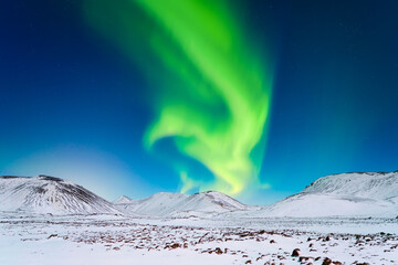 Wall Mural - aurora borealis. northern lights over the mountains. a winter night landscape with bright lights in 