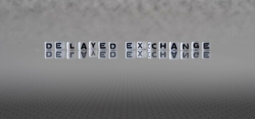delayed exchange word or concept represented by black and white letter cubes on a grey horizon background stretching to infinity