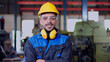 © otello-stpdc - Portrait of Professional industrial engineer, technician, factory worker, machinery operator wear safety uniform, hardhat, safety glasses look at camera, smile. Employee working at industry factory.