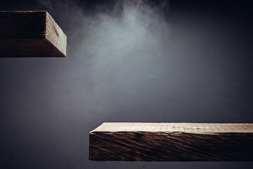 Wall Mural - Wood plank podium with smoke in the dark