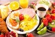 health brunch with scrambled egg, fruits and coffee cup
