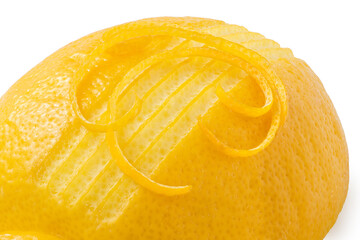 Poster - Detail of partially peeled half of lemon with strings of lemon zest.