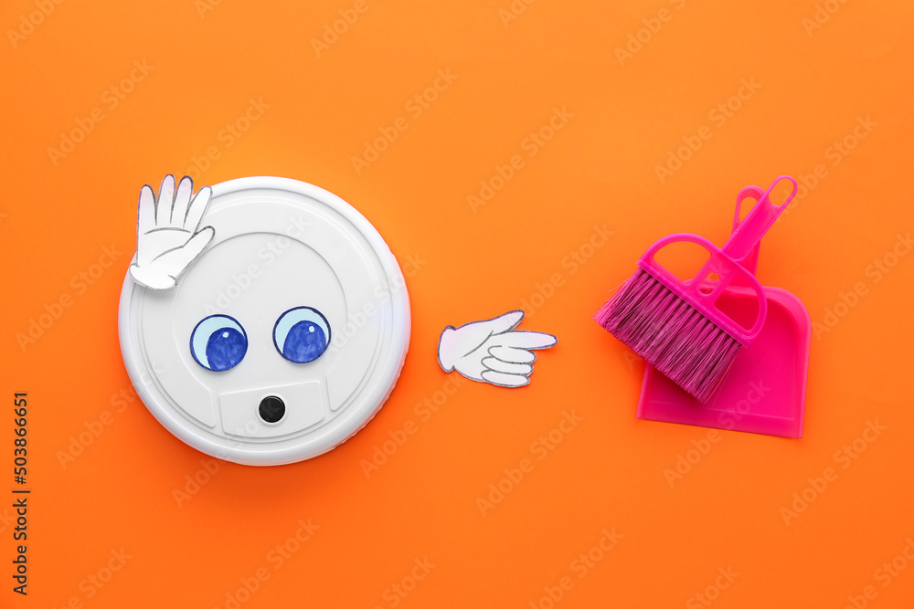 Modern robot vacuum cleaner with drawn eyes, broom and dustpan on color background