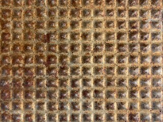 Wall Mural - a rusty metallic surface with uniform pattern