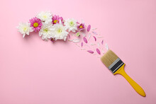 Brush Painting With Colorful Flowers And Petals Of Chrysanthemum On Pink Background, Flat Lay. Creative Concept