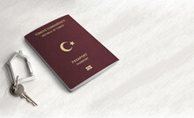 Turkish Passport Citizenship By Real Estate Investment ,Passport And Home Key On A Wood Table ,Space For Writing