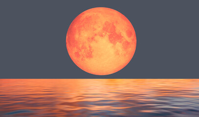 Wall Mural - The Big bloody red moon  is reflected in the waves of the sea  