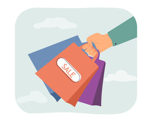 Sticker - Shopping bags in hand flat vector illustration. Person or customer making purchases at sales. Discounts, store, promotion concept for banner, website design or landing web page