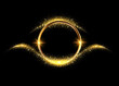 Gold circle of shiny stardust on a dark background. Shining gold frame. Glittering sequins and golden ring. Round border, frame.