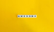 Awesome Word on Letter Tiles on Yellow Background. Minimal Aesthetics.