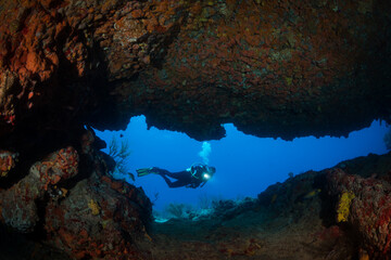 Diver on the  Fishbowl divesite off the Dutch Caribbean island of Sint Maarten