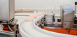 © Nataliia - Conveyor Belt Food.Automated production line in modern food factory.A modern plant.Factory production food from meat. Production line with packaging and cutting of meat.