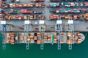 Aerial view Container at industrial ports in the business of import, export, logistics and international maritime transport, loading of containers with cranes,