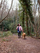 © Cultura Creative - Girl with dog in forest