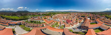 Panoramic 360 Aerial View Of Lucca. City Homes With Walls Promenade On A Beautiful Sunny Day