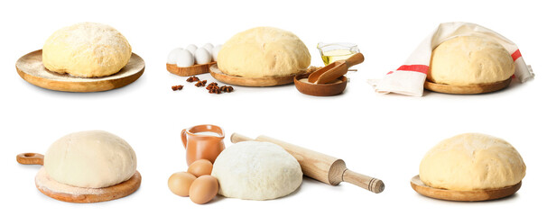 Set of fresh dough with ingredients and rolling pin on white background