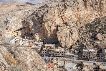 Wall Mural - The town of Maaloula located in south Syria was built into the ragged mountainside