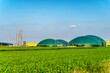canvas print picture - Moderne Biogasanlage zwischen mehreren Feldern in ländlicher Region