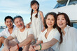 © View Stock - Happy family aboard a yacht out to sea