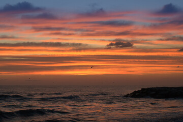 Wall Mural - sunrise over the sea,water,sunset,sky, ocean, orange, cloud, beautiful,morning, red, waves, light, 