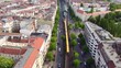public transport in the city U bahn leaves station Eberswalder Spectacular aerial view flight track from above drone footage of Berlin Prenzlauer Berg Schönauer Allee 2022 Cinematic by Philipp Marnitz
