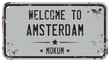 Welcome To Amsterdam Message On Rusty License Plate