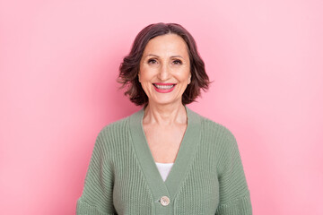 Poster - Portrait of attractive brown-haired cheerful woman mother mom wear knitted cardigan isolated over pink pastel color background