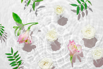 Wall Mural - Sunny summer cosmetic background with flowers.